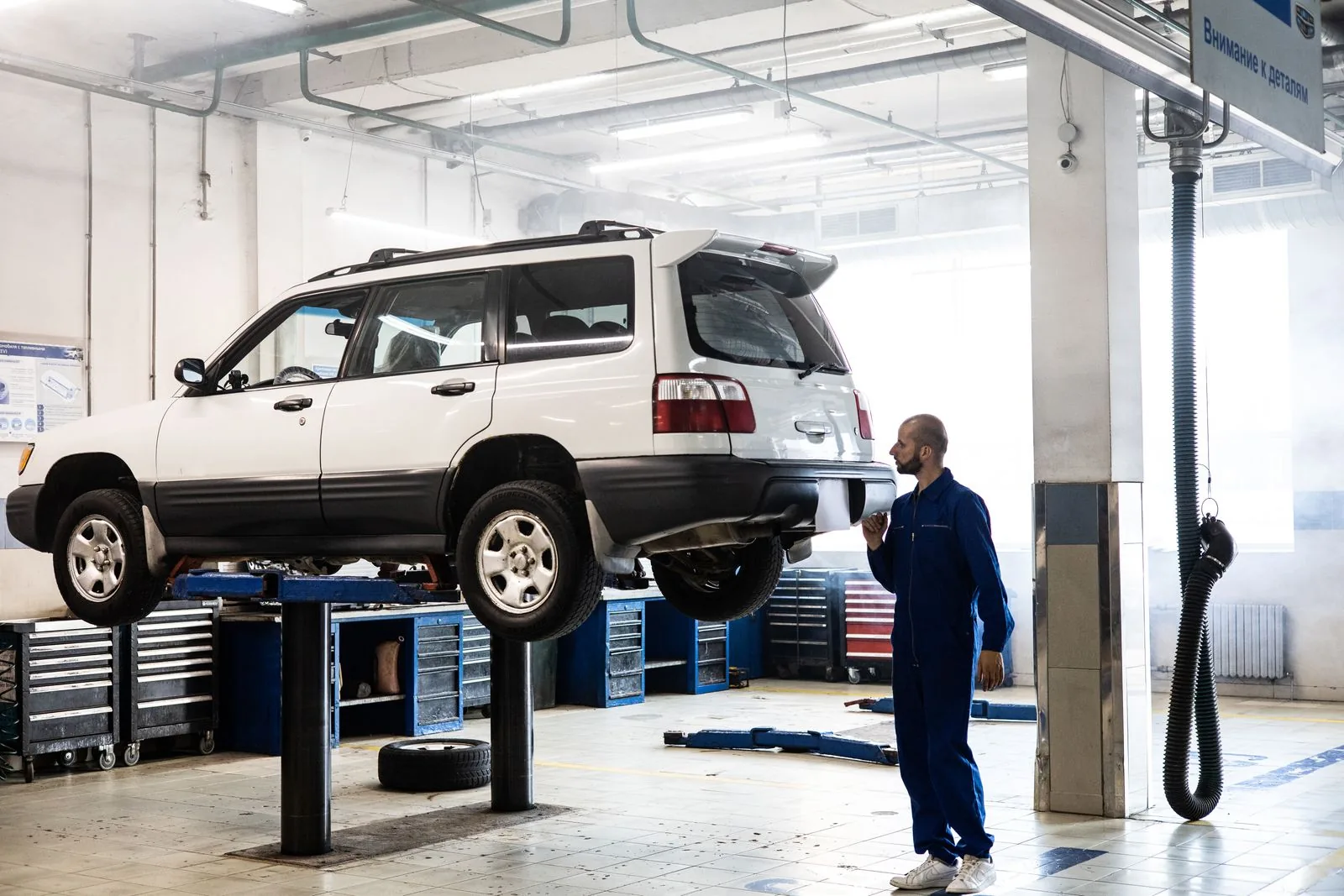Fleet & truck services — vehicle on a lift in a modern auto repair shop