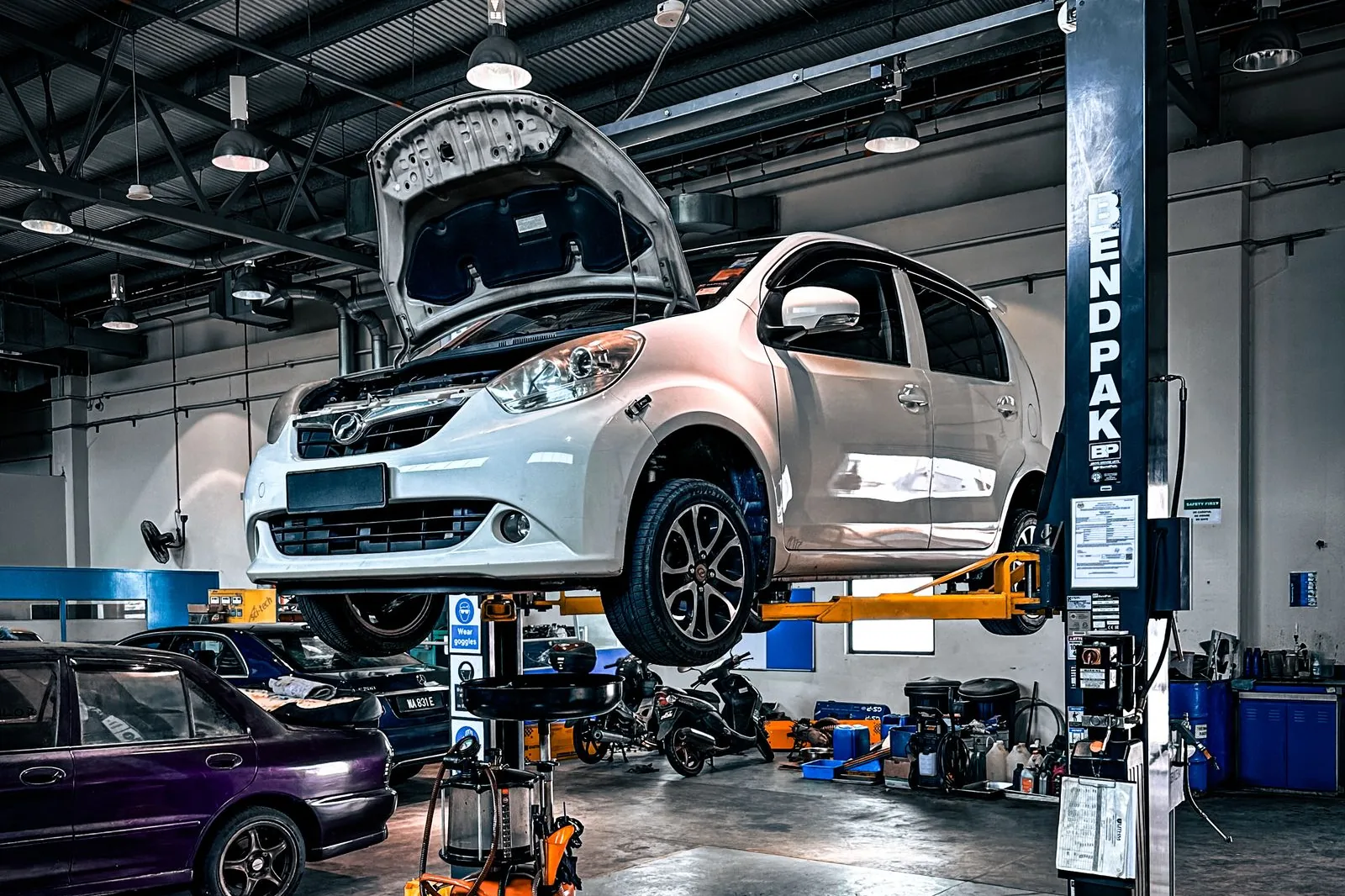 Fleet & truck services — vehicle on a lift in a modern auto repair shop